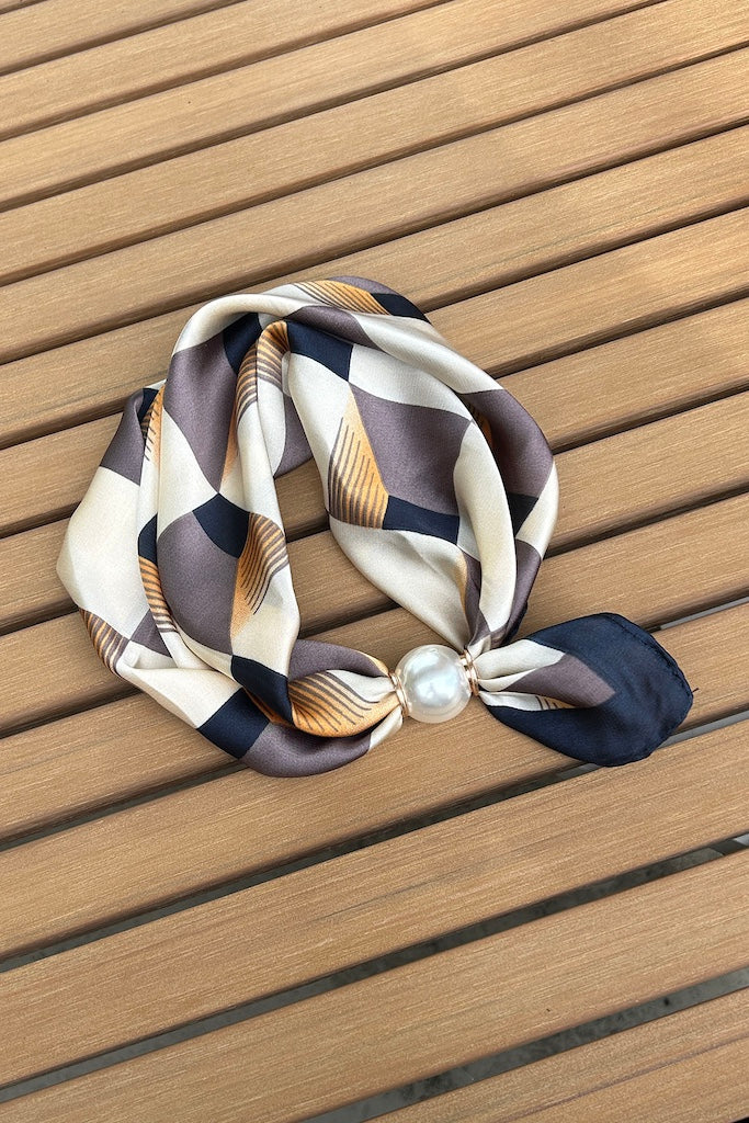 Pearl fasten neck tie cityscape