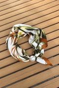 Pearl fasten neck tie Reed Garden
